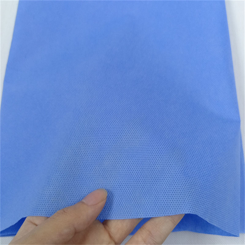 1704866329362858.jpg 一手货源白色蓝色SMS SMMS SSMMS拒水防水透气隔离手术衣用无纺布4.jpg